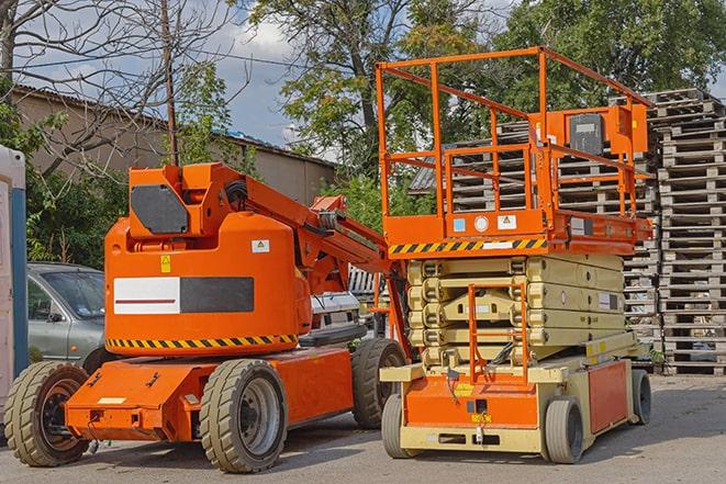 pallets being moved by forklift in a warehouse setting in Crystal, MN